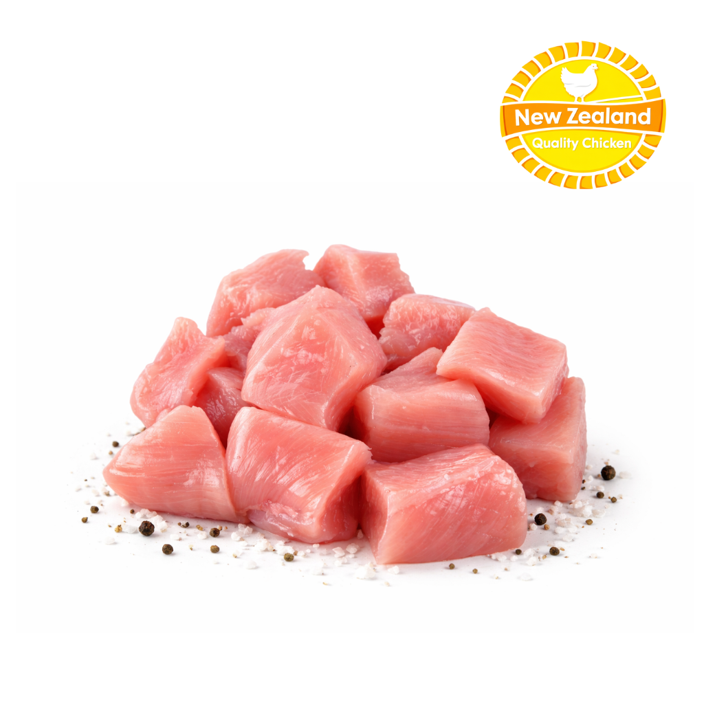 Diced chicken pieces with New Zealand Quality Chicken logo on a white background