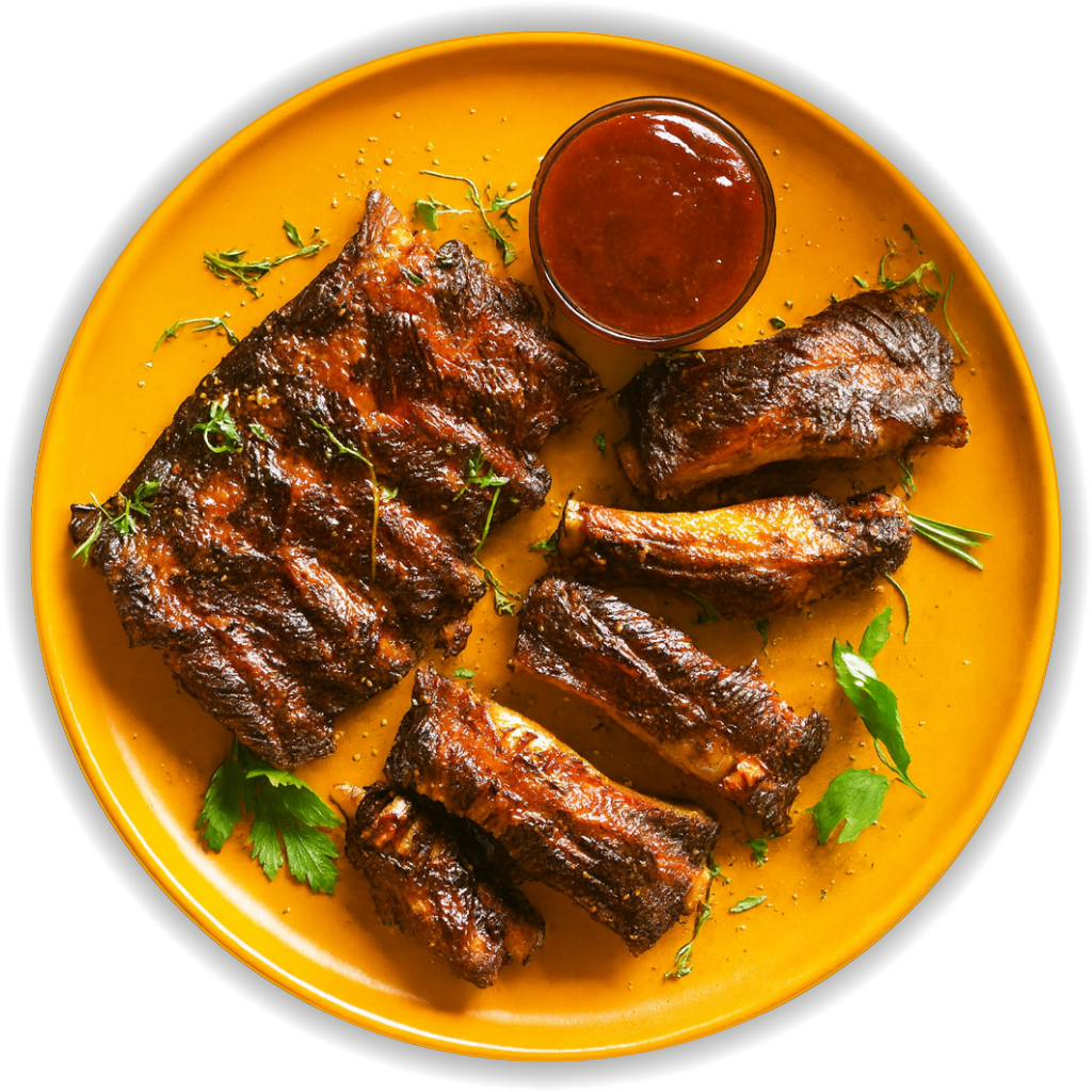 Braised ribs on a yellow plate with a side of sauce